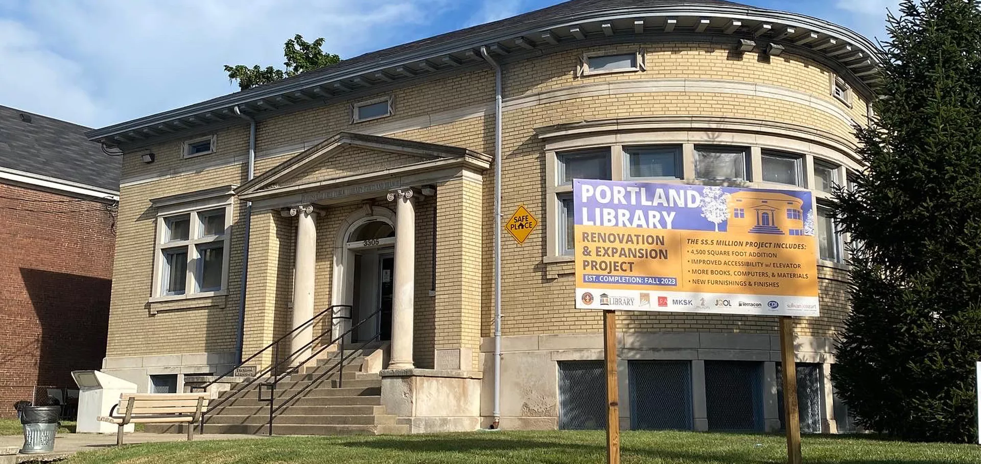 Outside of Portland Library with renovation and expansion sign