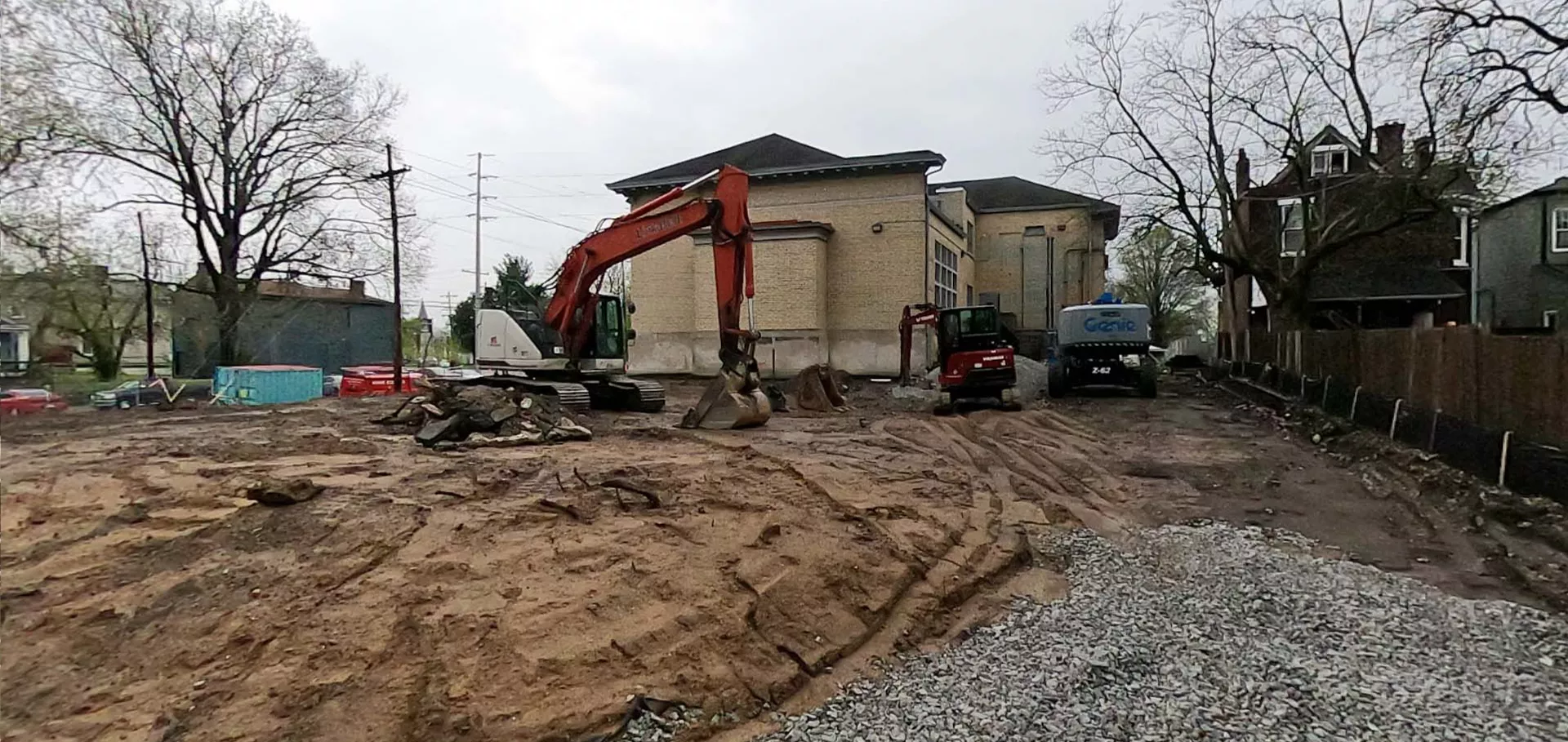 Back hoes clearing ground behind the Portland library
