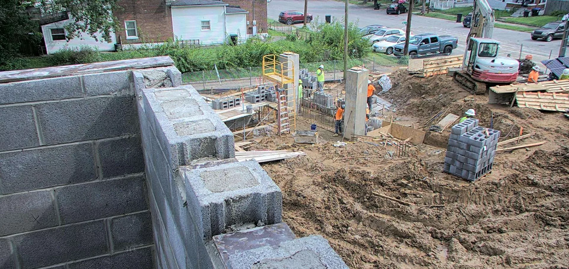 Construction workers working on the external walls of Portland